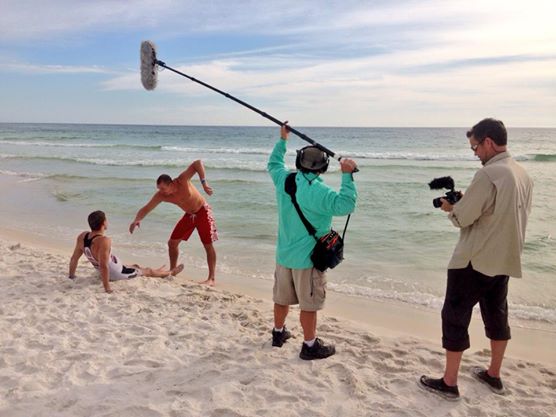 Mark and Brooks filming Eric giving Joe swimming tips